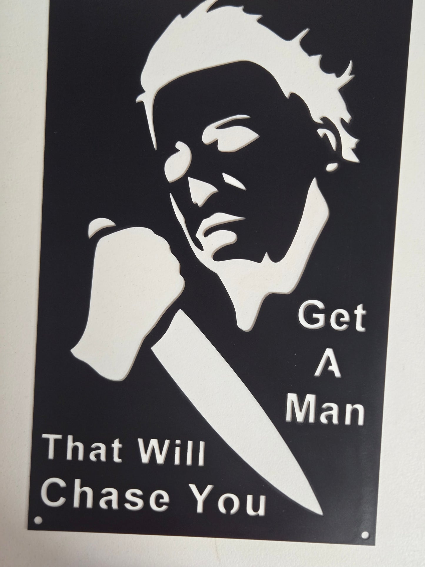 "Get a Man That Will Chase You" – Horror-Inspired Metal Wall Sign with Knife Silhouette