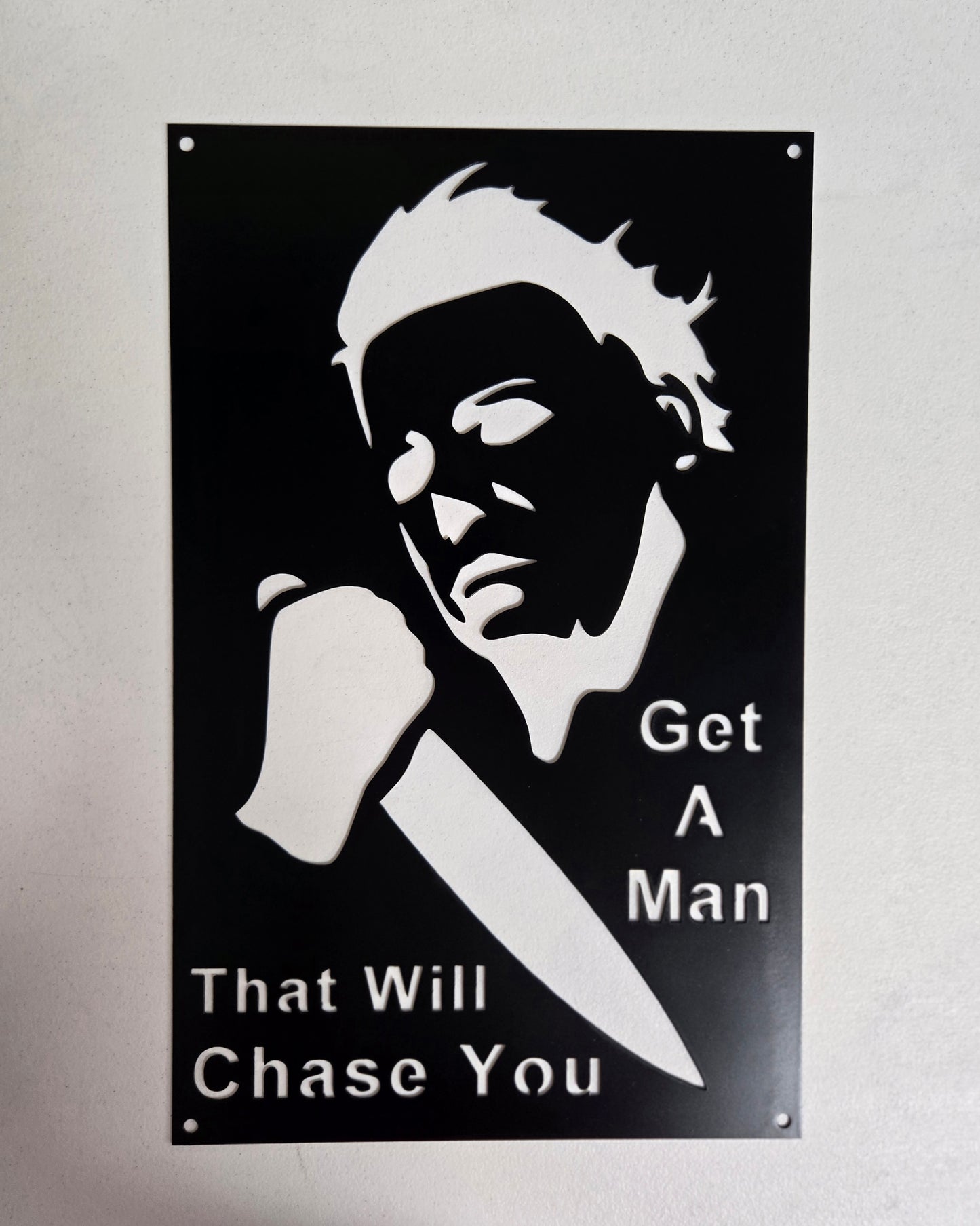 "Get a Man That Will Chase You" – Horror-Inspired Metal Wall Sign with Knife Silhouette