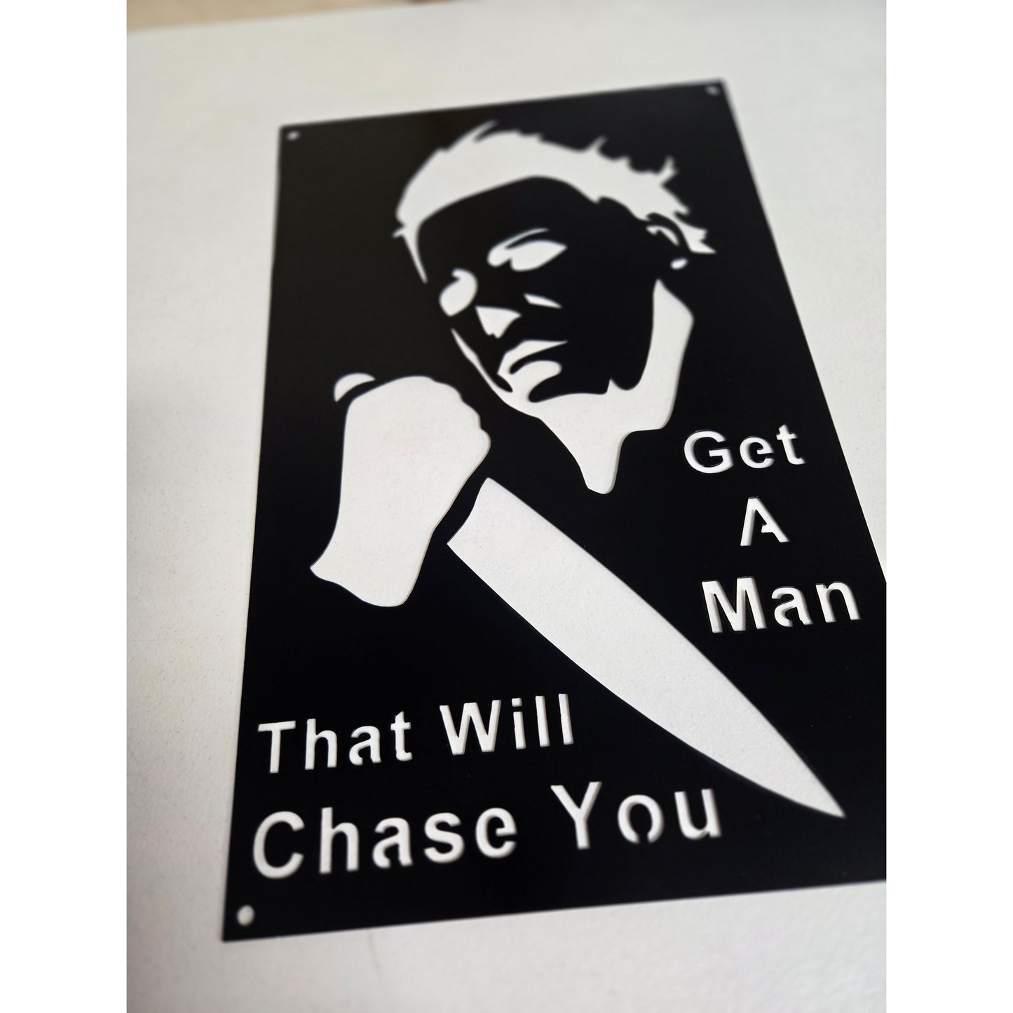 "Get a Man That Will Chase You" – Horror-Inspired Metal Wall Sign with Knife Silhouette