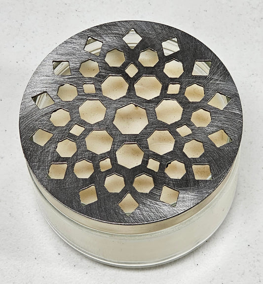 Geometric metal candle topper with Moroccan mandala constellation design