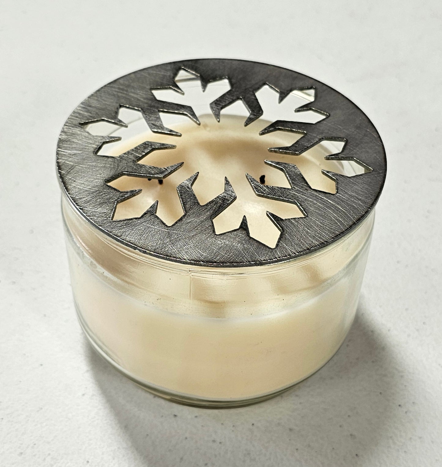 Holiday metal candle topper for seasonal decor