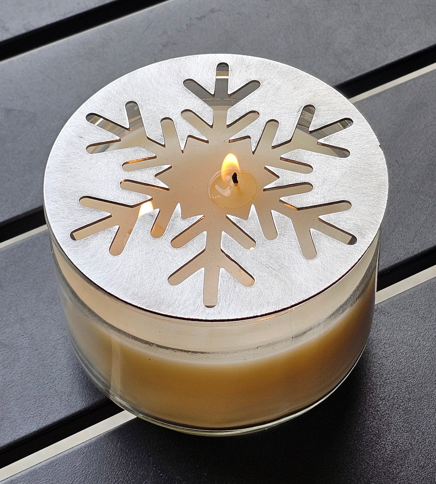 Frostfall metal snowflake candle topper on jar candle for Christmas decor