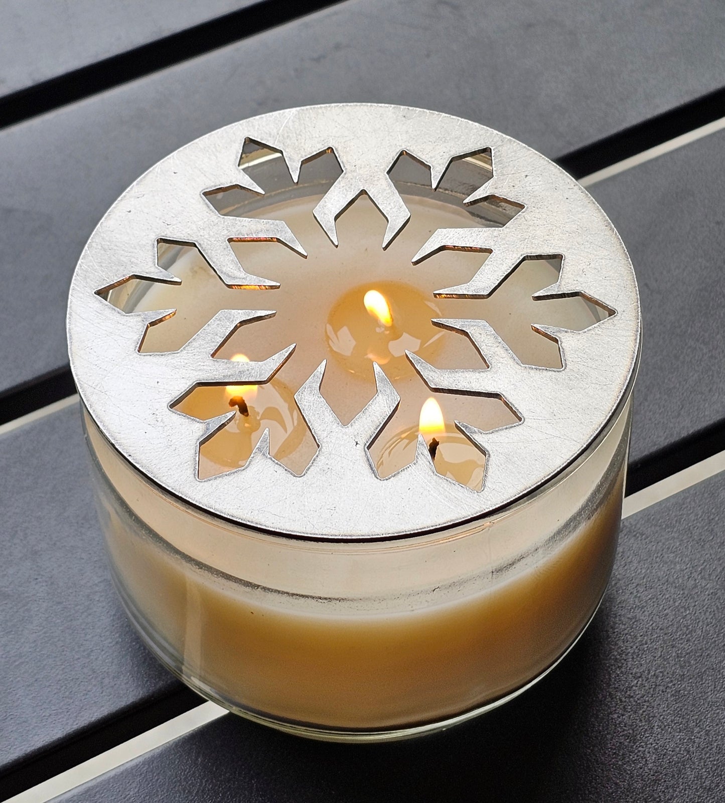 Glacier snowflake metal candle topper on jar candle for Christmas decor