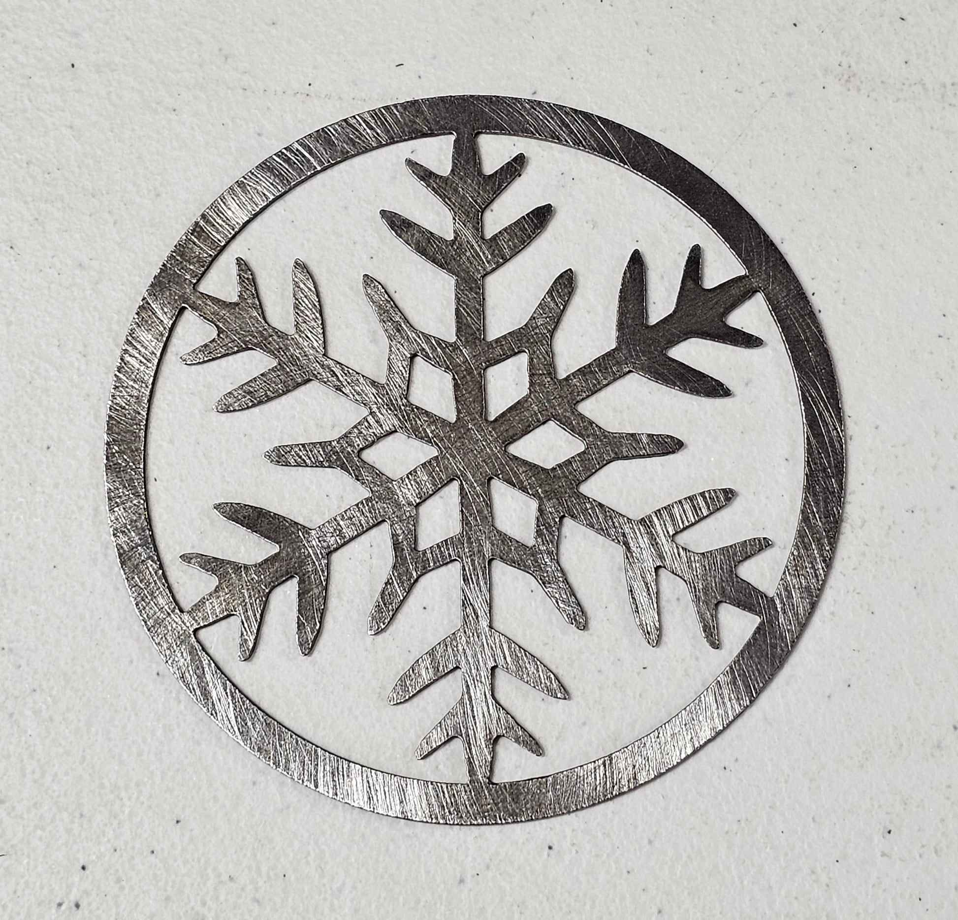 Holiday metal candle topper for seasonal decor