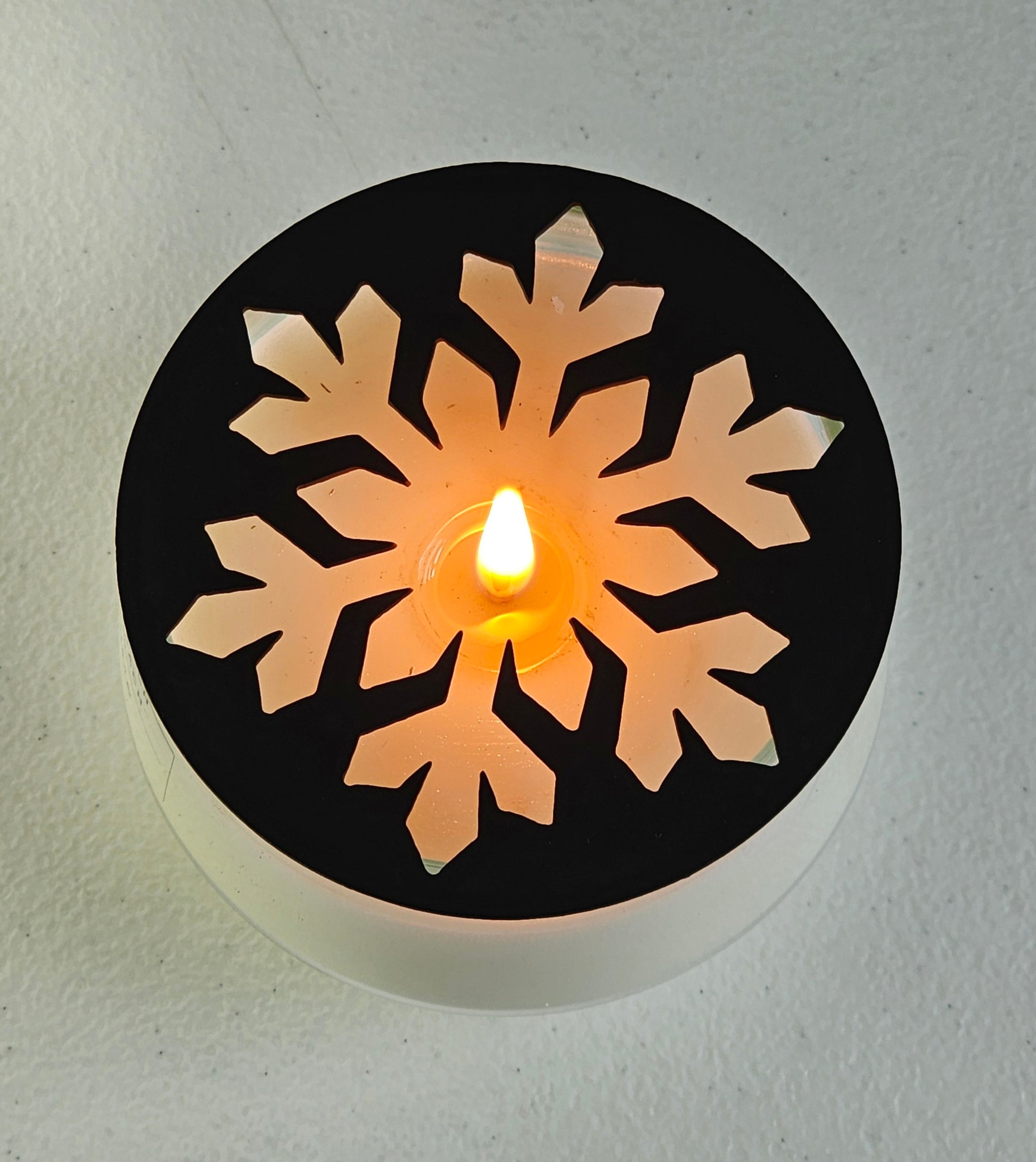 Glacier snowflake metal candle topper on jar candle for Christmas decor