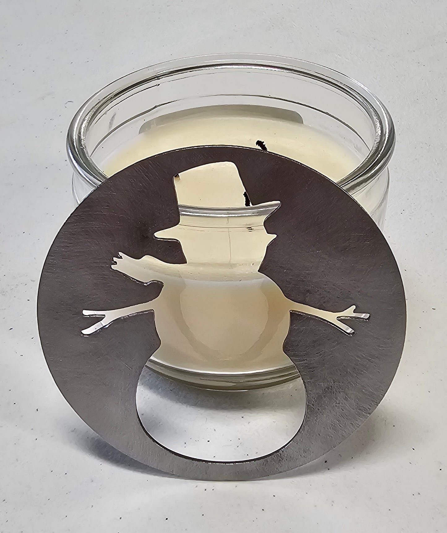 Christmas candle topper with snowman cutout metal lid