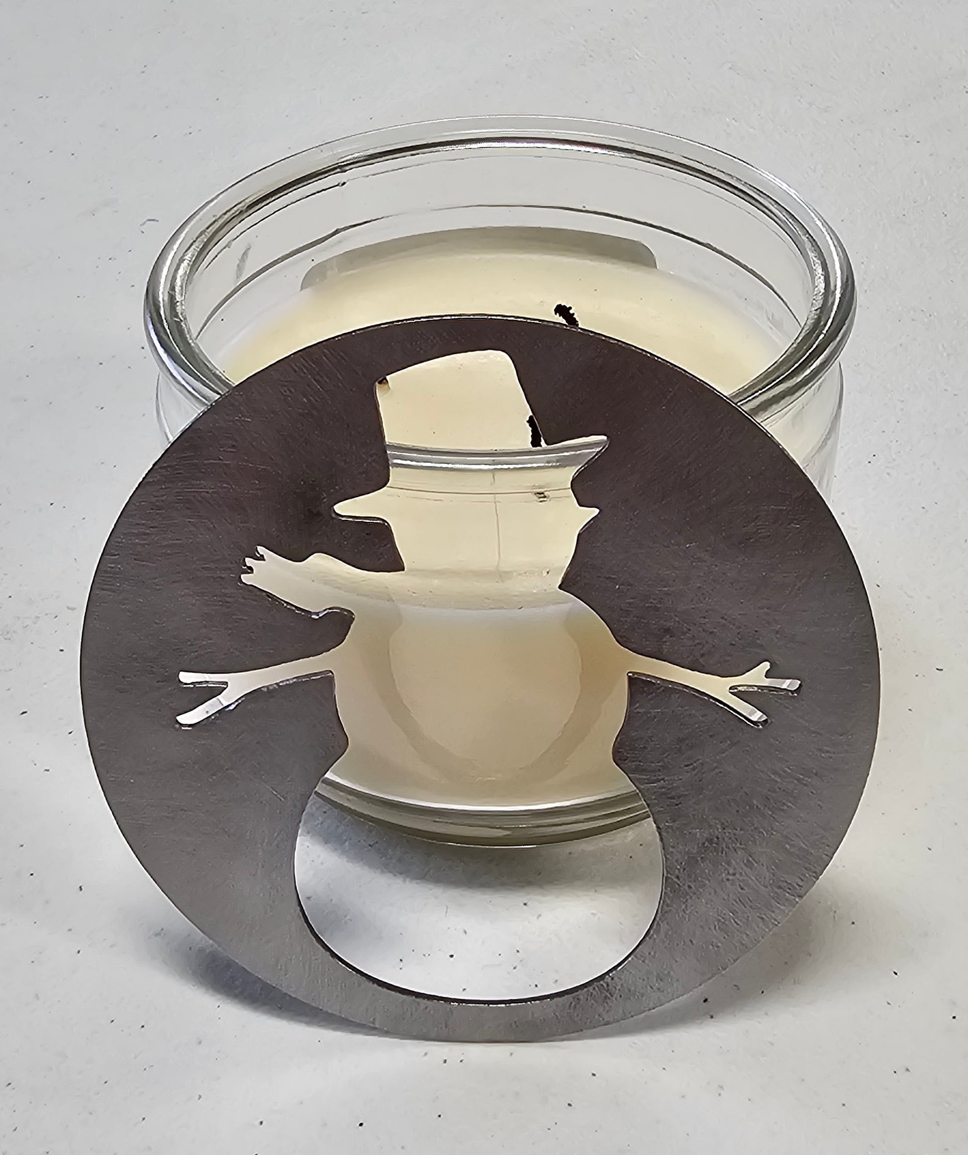 Christmas candle topper with snowman cutout metal lid