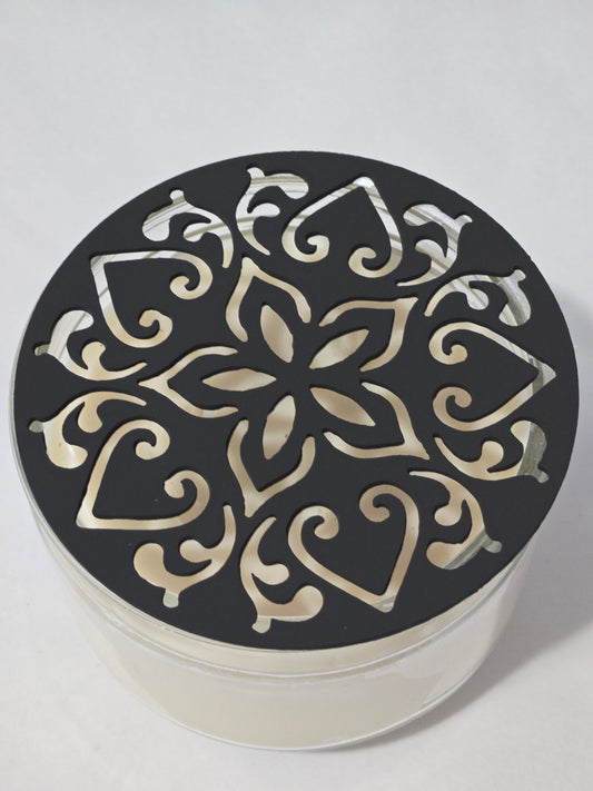 Metal floral star candle topper on jar candle for farmhouse decor