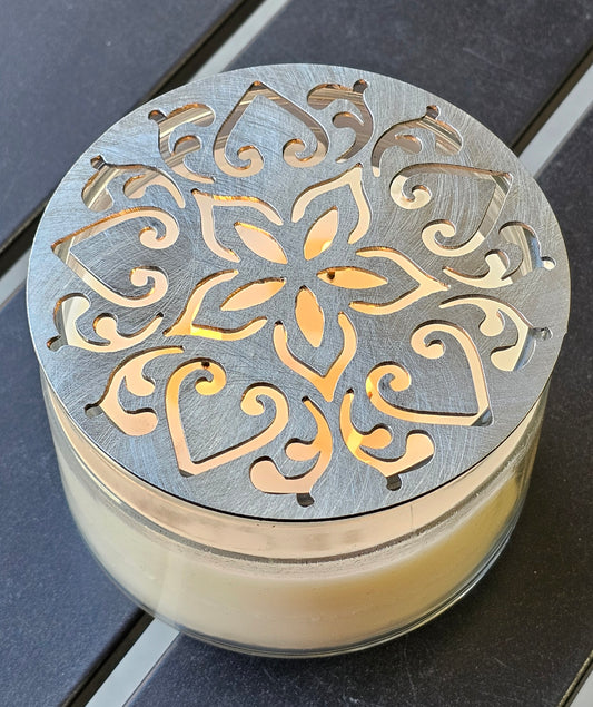Metal floral star candle topper on jar candle for farmhouse decor