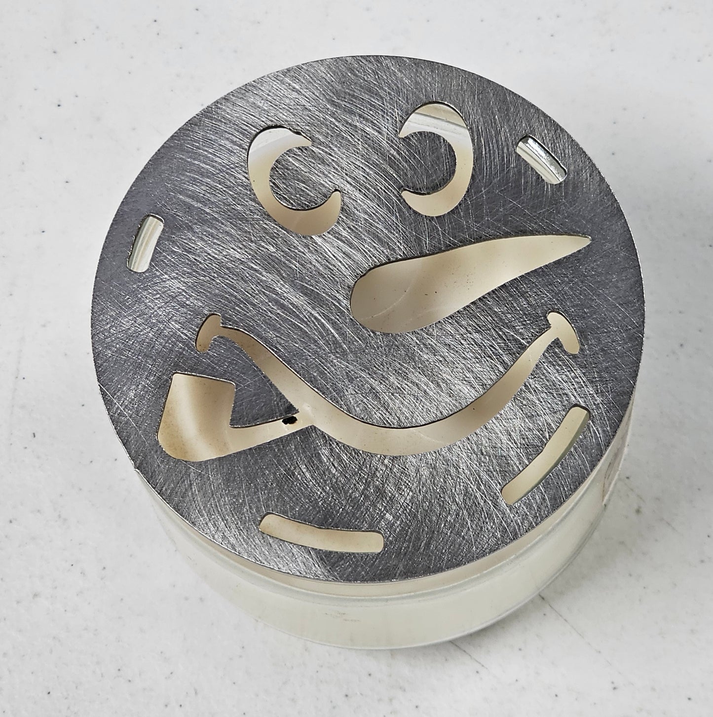 winter candle topper with snowman face