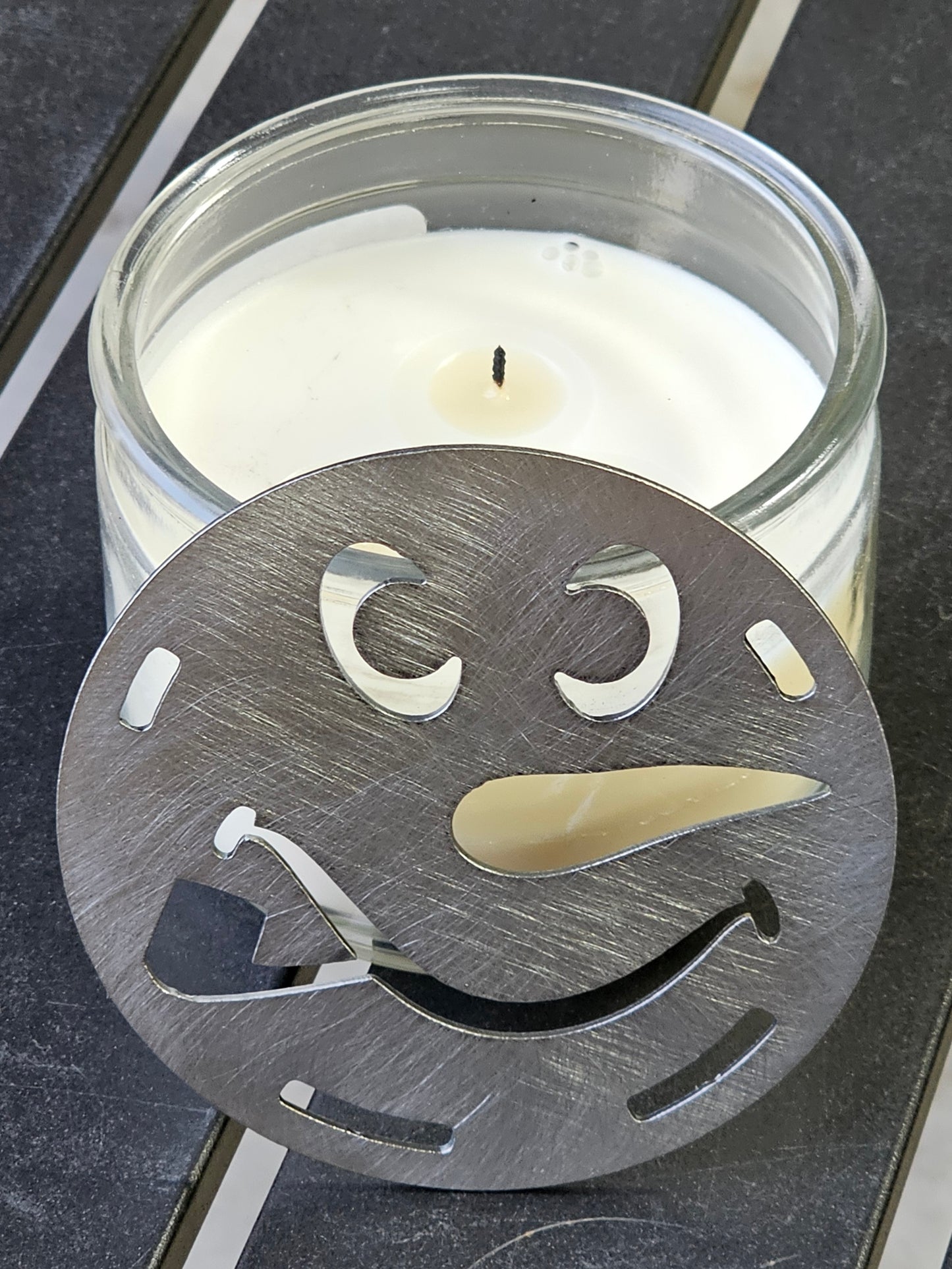 snowman candle topper on jar candle