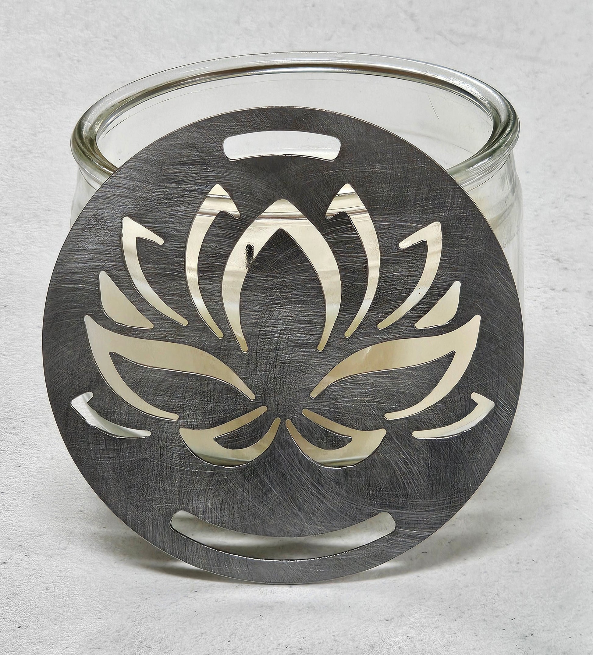 Silver lotus candle lid with cutout design
