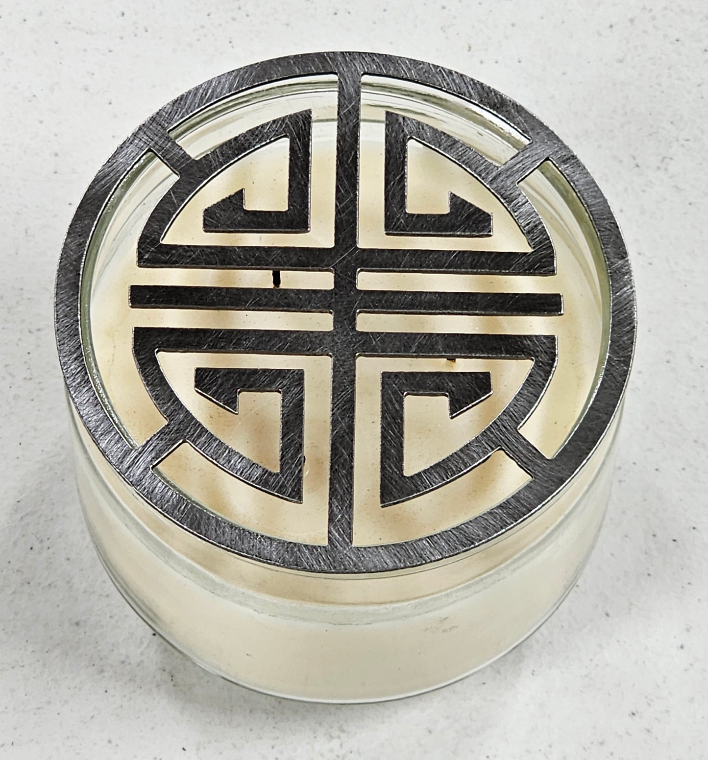 Decorative lotus candle topper for even burn