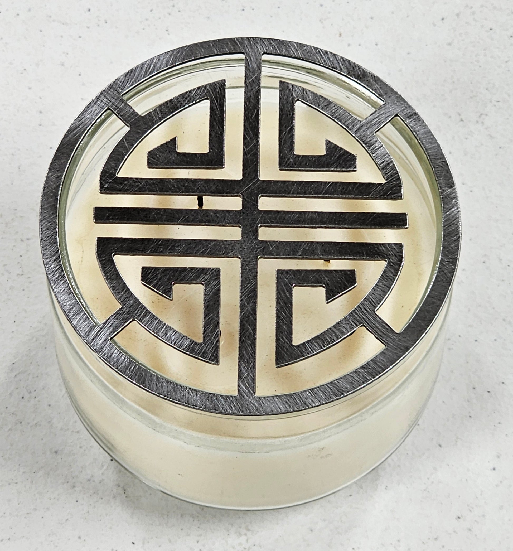 Decorative lotus candle topper for even burn