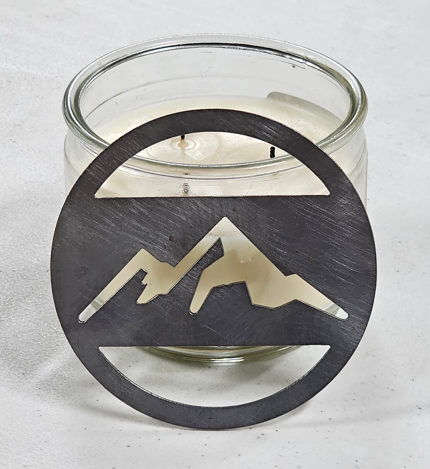 Wilderness themed jar candle topper in raw metal