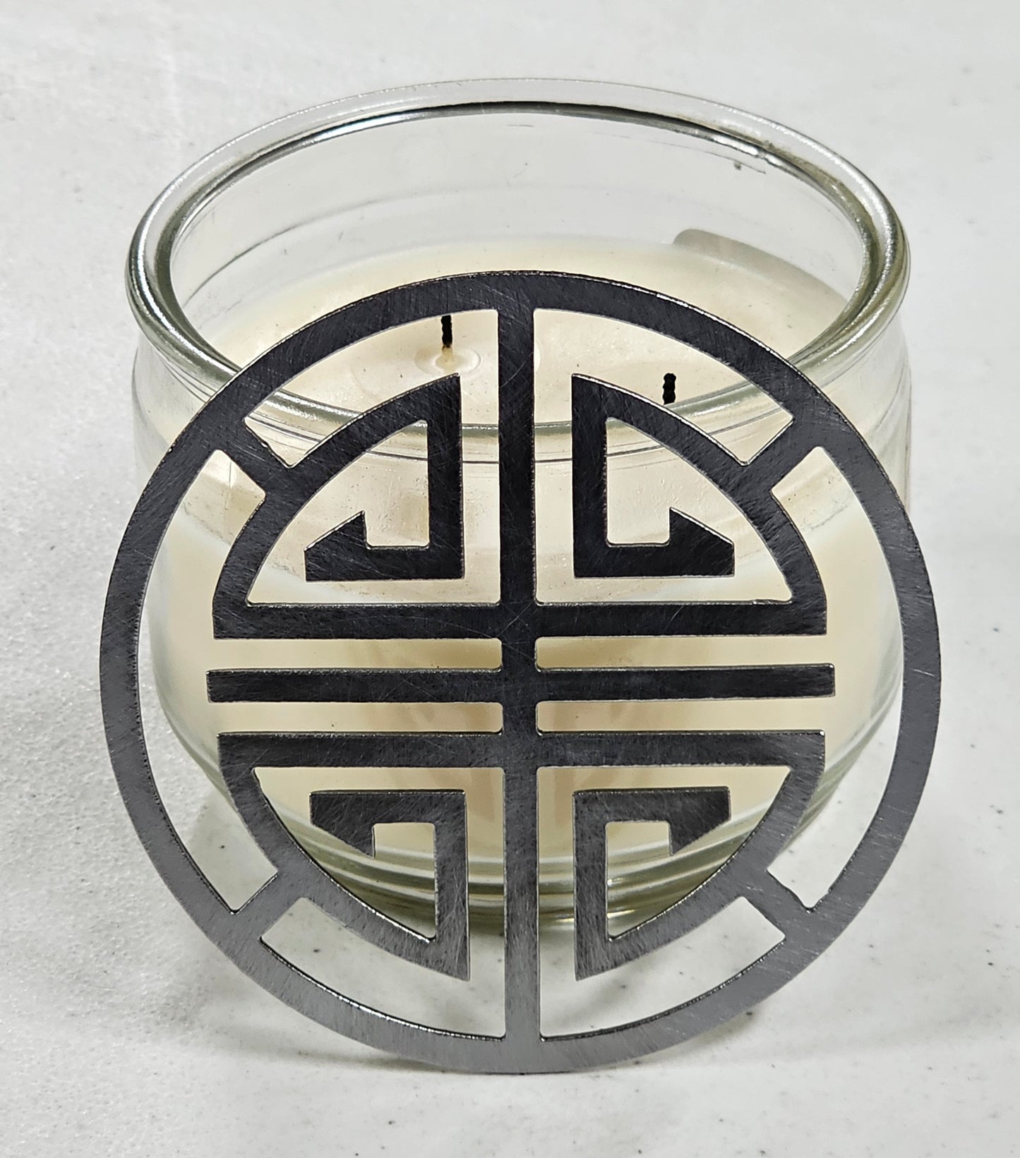 Decorative lotus candle topper for even burn
