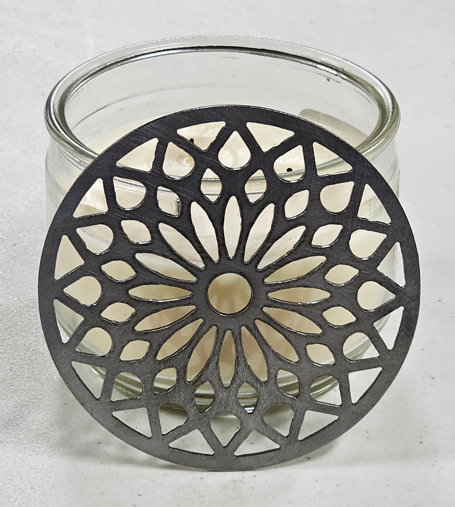 Candle jar topper with mosaic cutout design