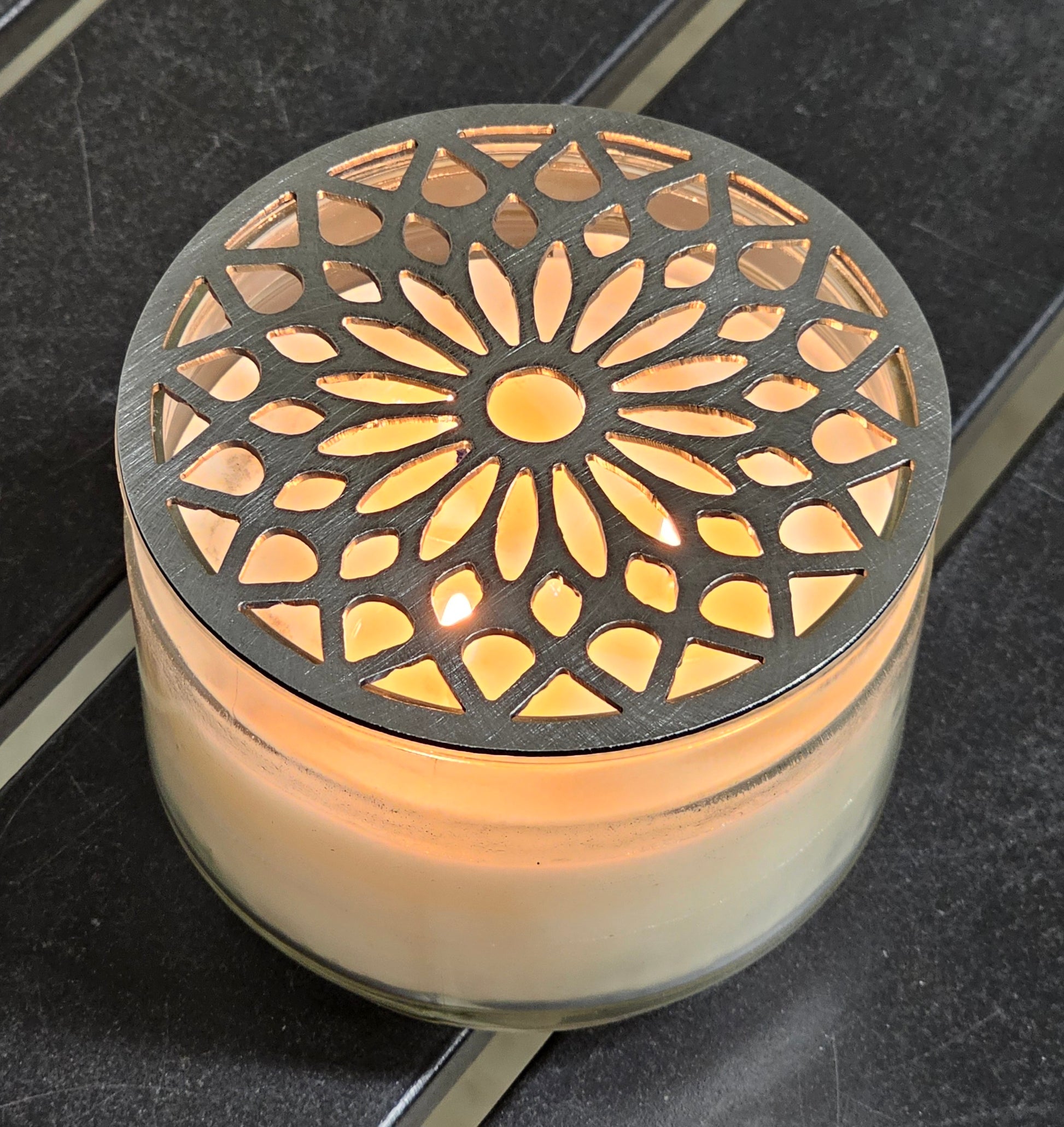 Mosaic crown candle topper on lit candle