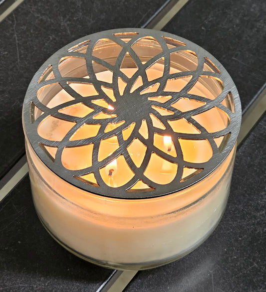Gilded rosette metal candle topper on jar candle for vintage decor