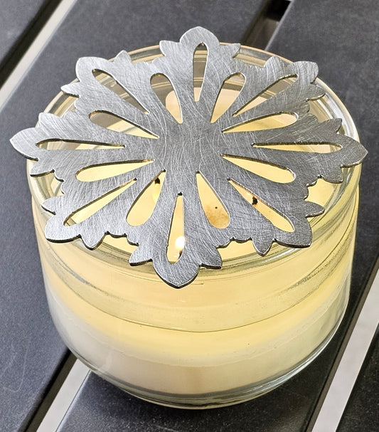 Classic snowflake metal candle topper on jar candle
