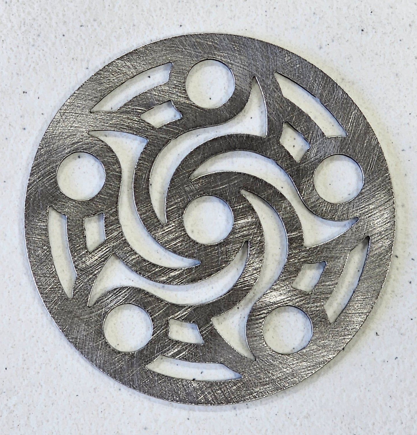 Reusable metal candle topper on jar candle