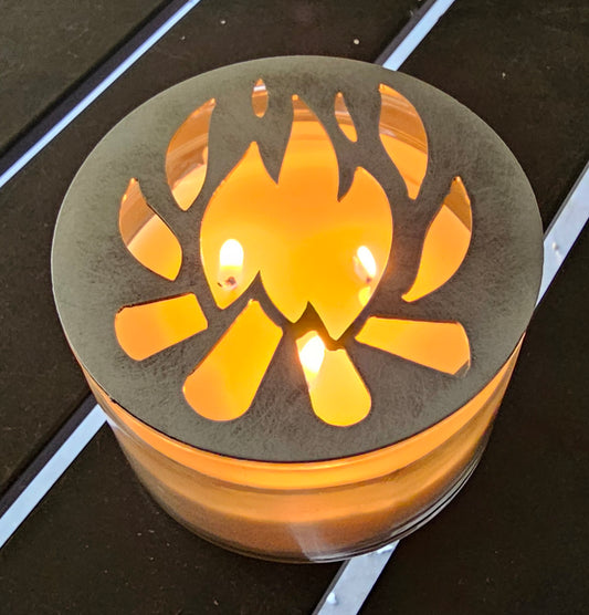 Campfire flame candle topper on jar candle preventing tunneling