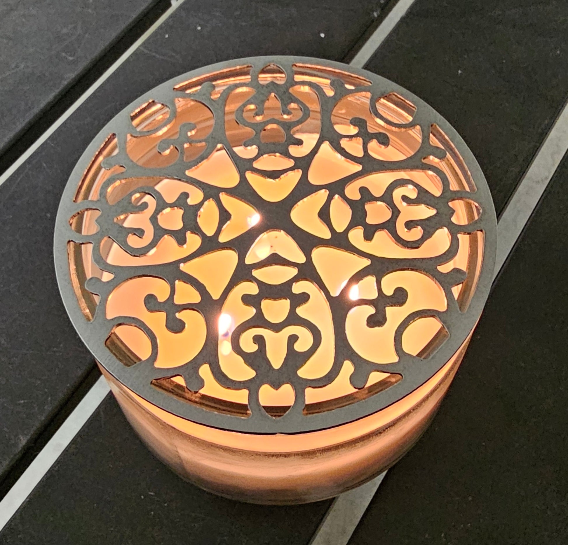 Whisperlight Filigree metal candle topper on jar candle