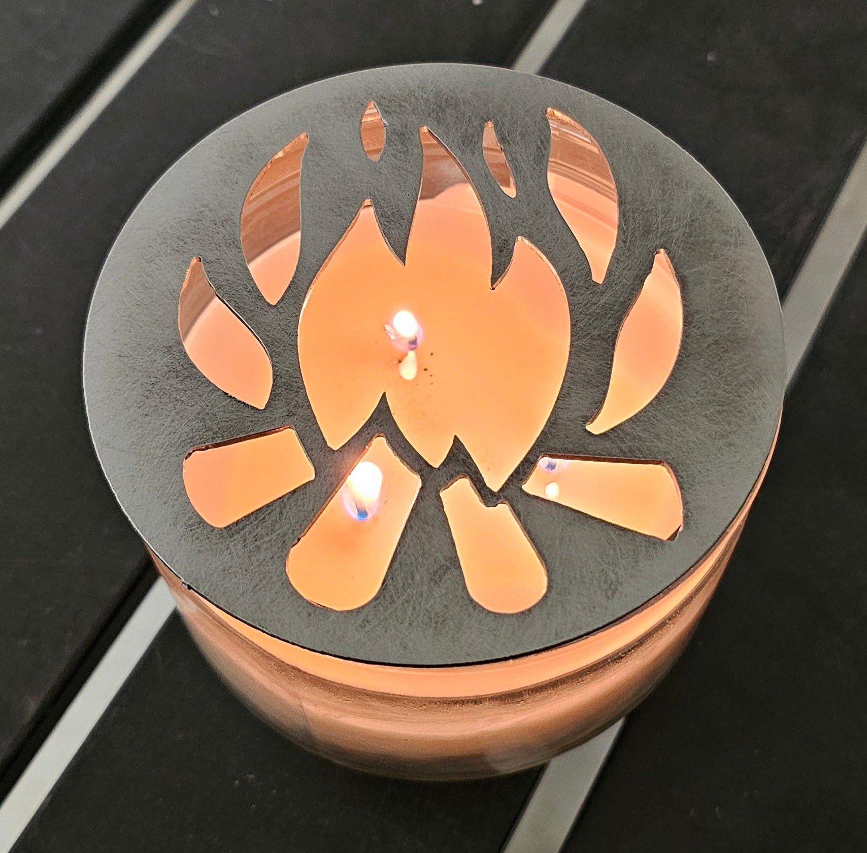 Rustic metal campfire candle topper for even burn