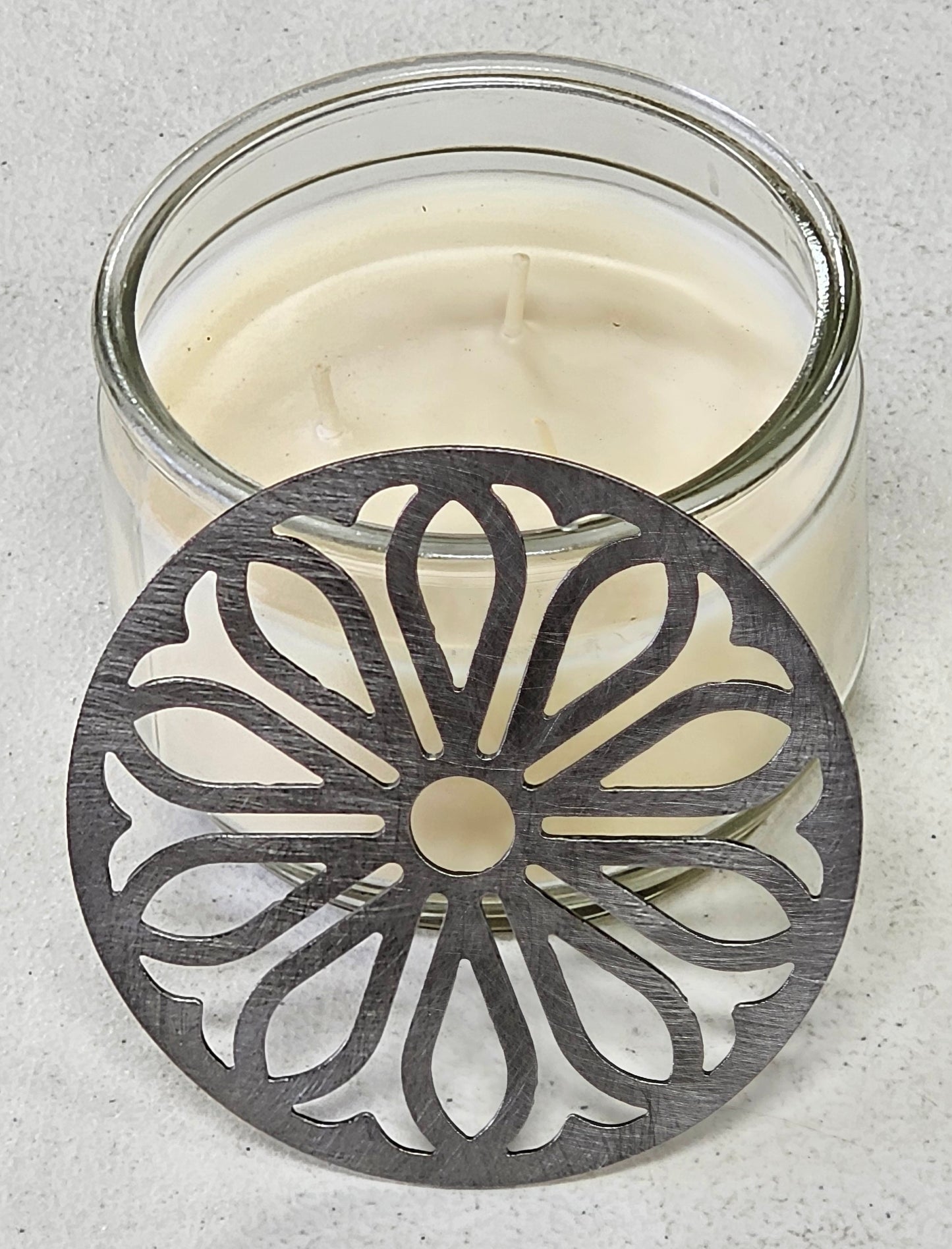 Radiant Sunpetal metal candle topper on jar candle