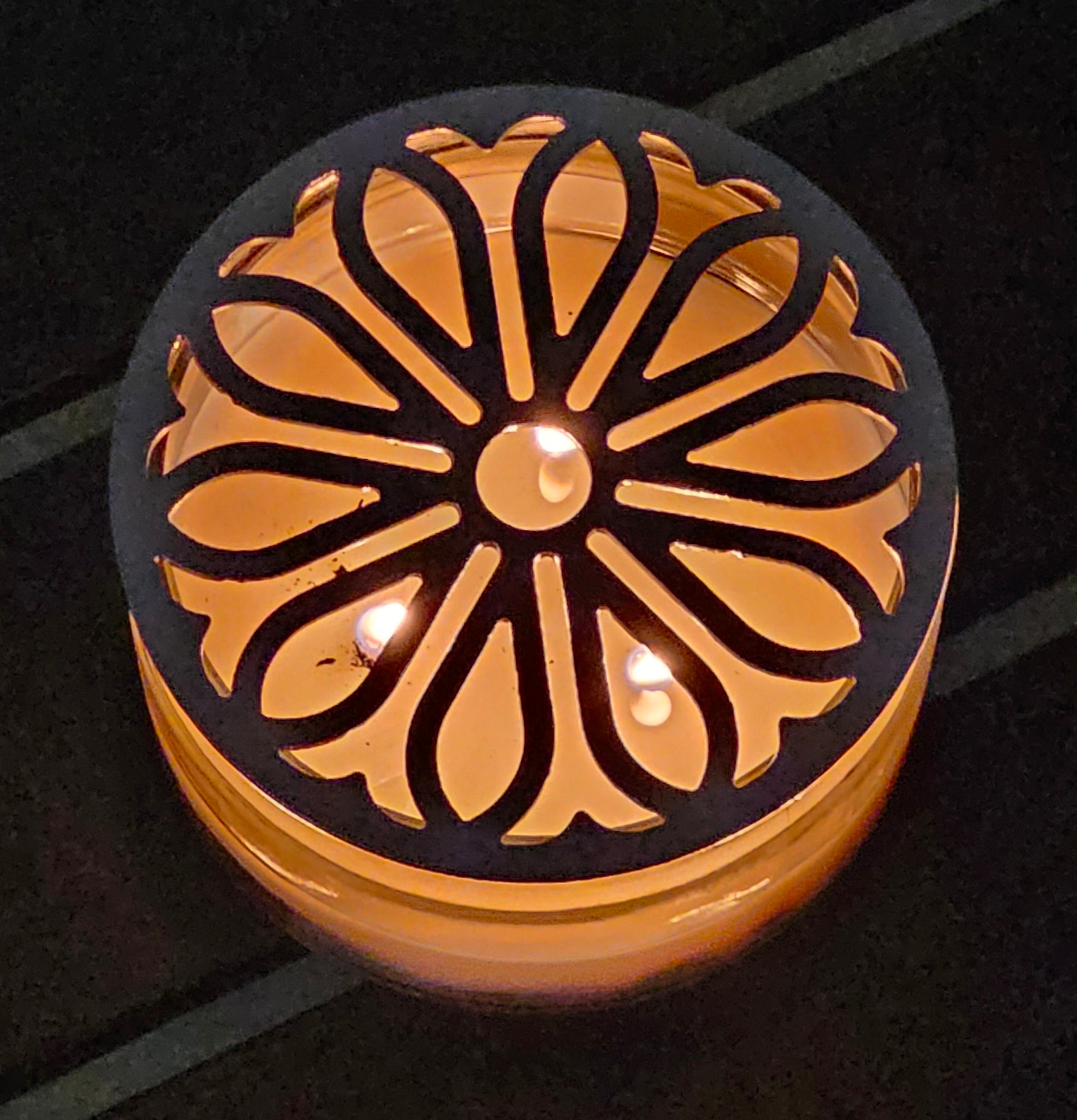 Radiant Sunpetal metal candle topper on jar candle