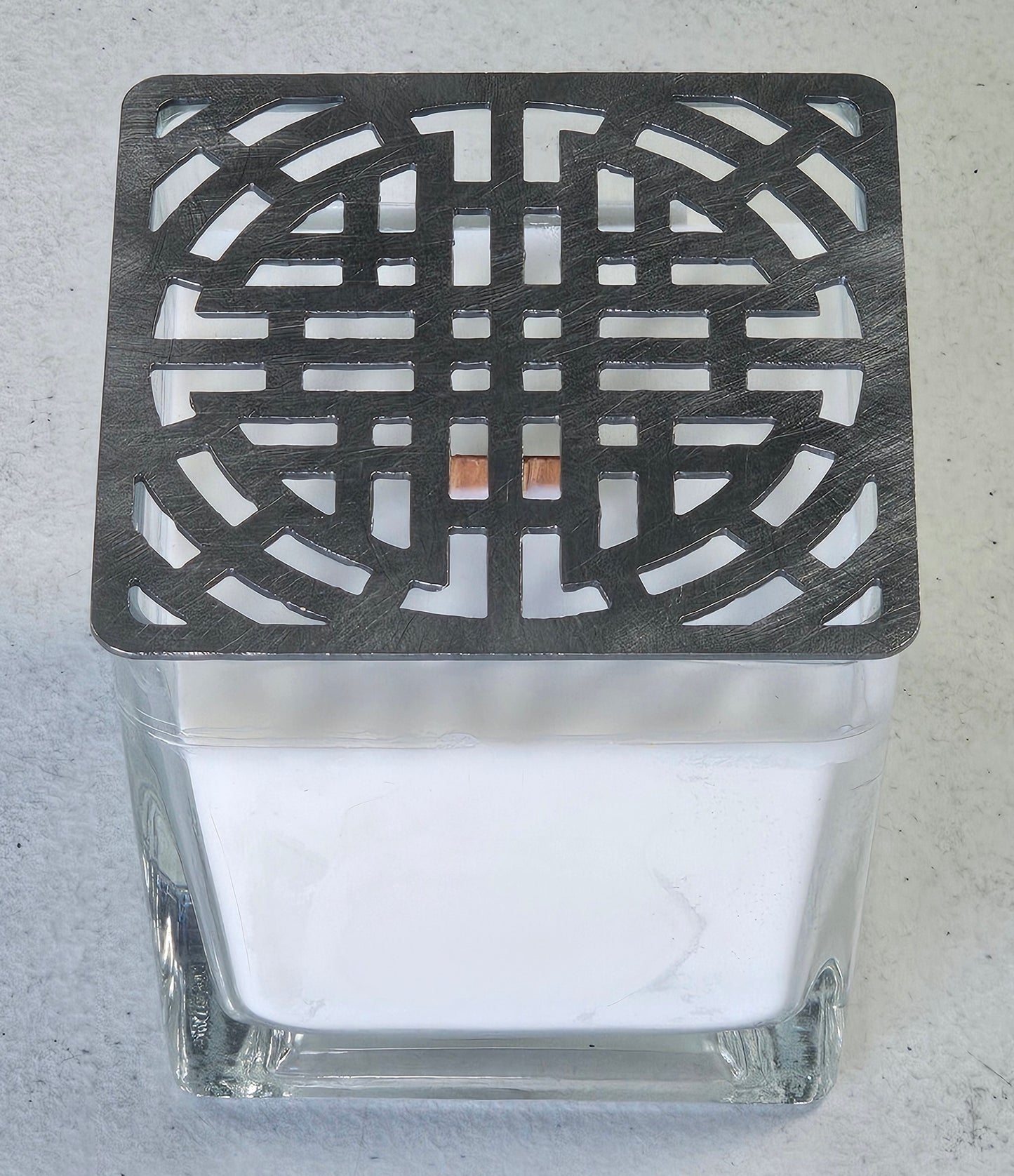 square metal lace candle topper on glass jar