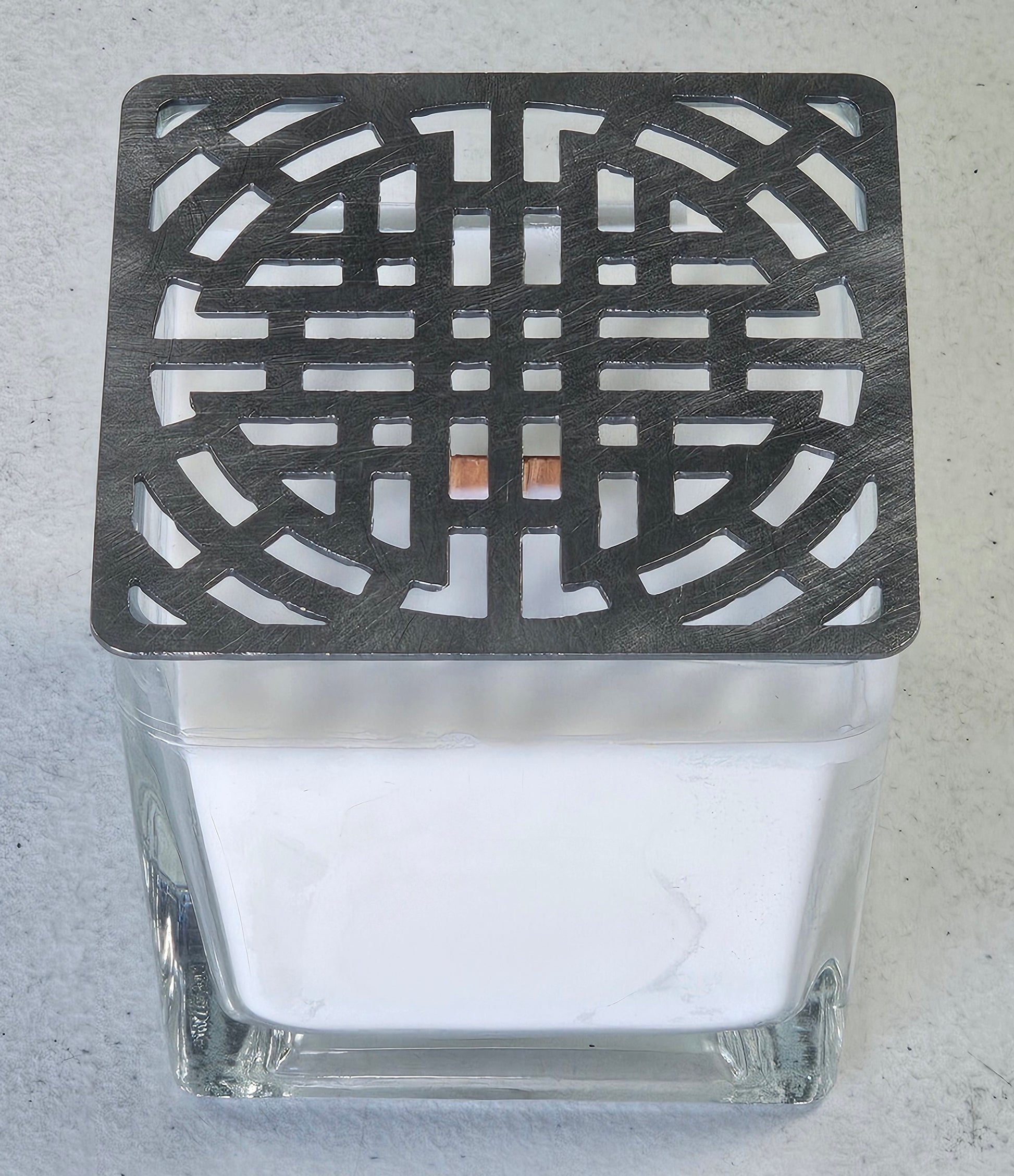 square metal lace candle topper on glass jar