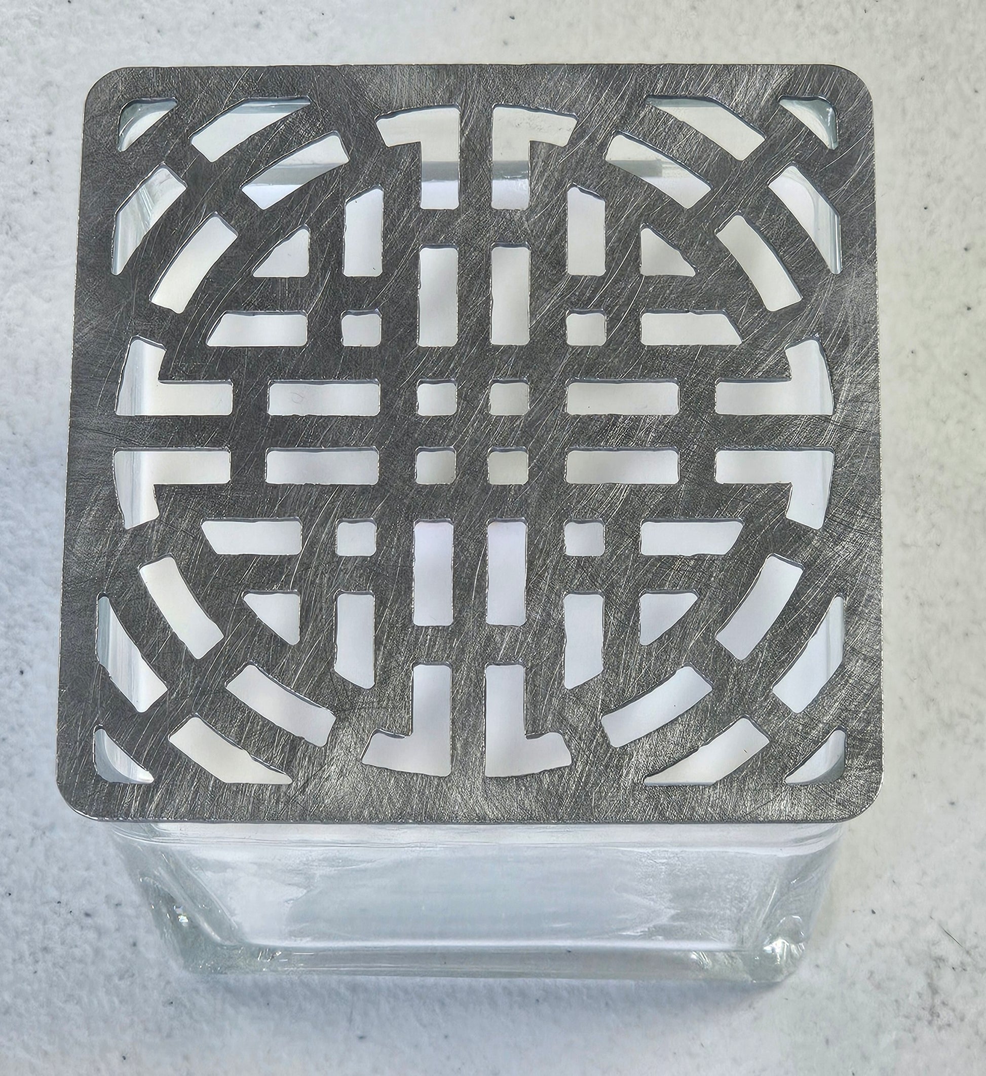square metal lace candle topper on glass jar