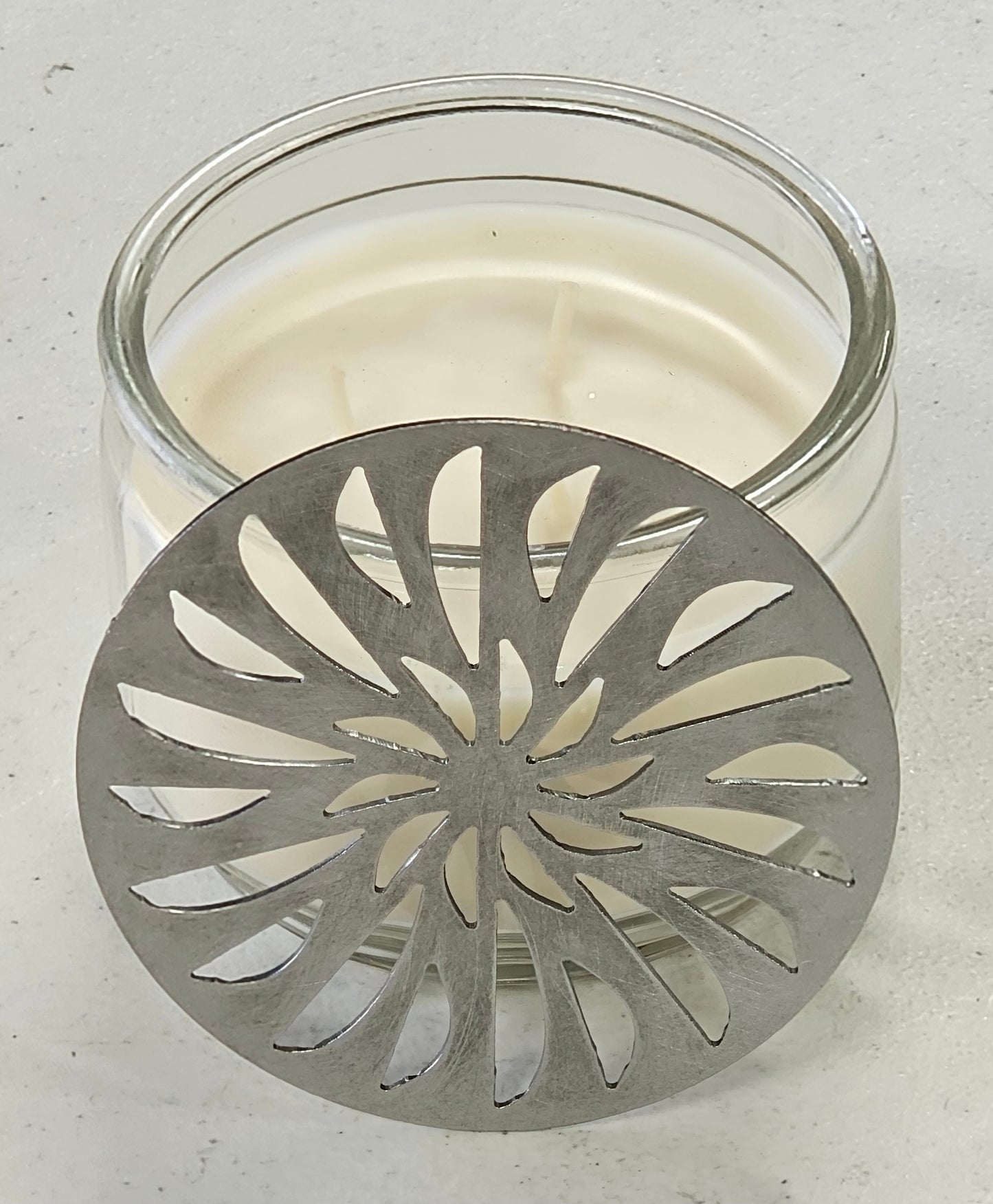 decorative metal candle lid pinwheel pattern