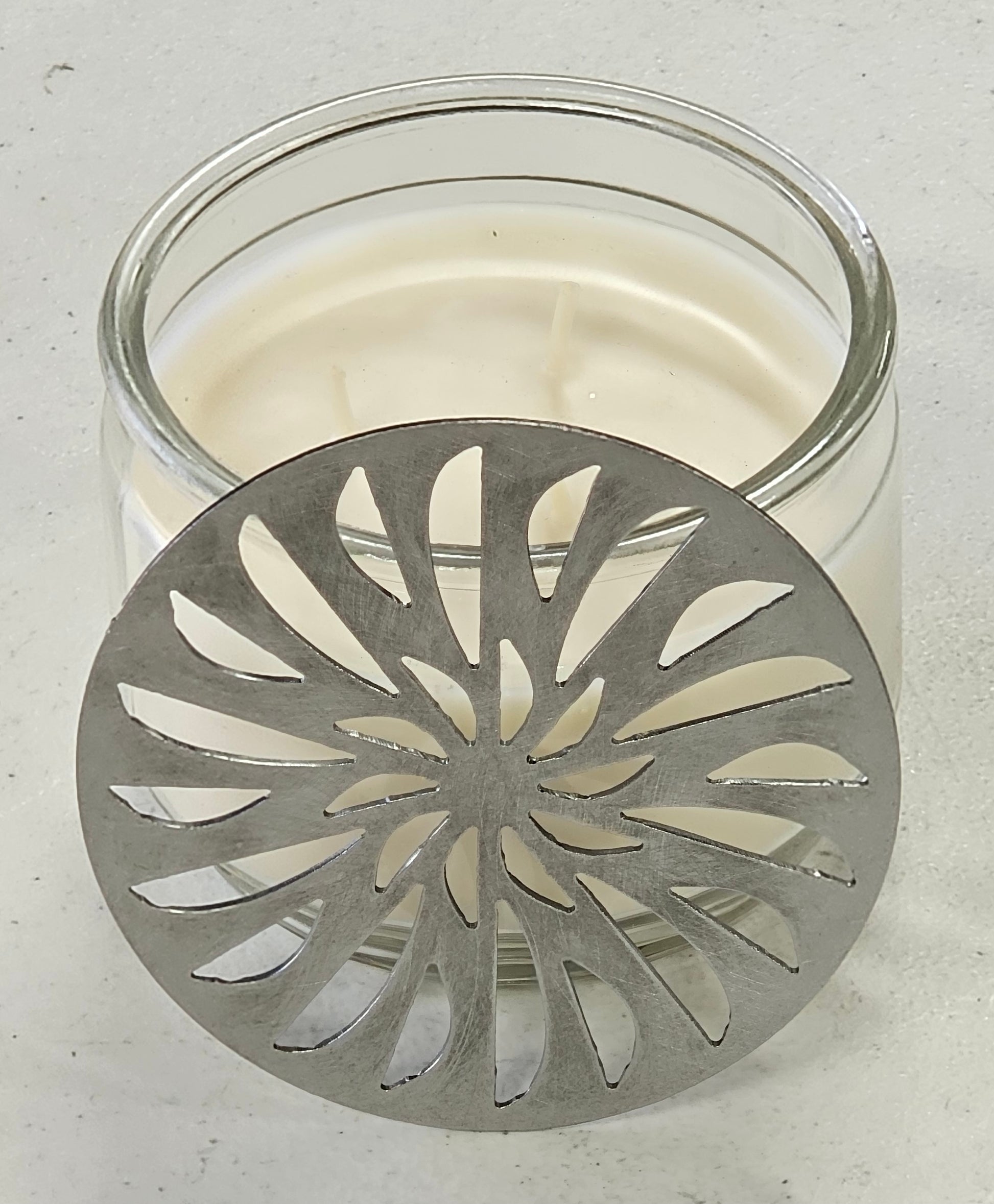 decorative metal candle lid pinwheel pattern
