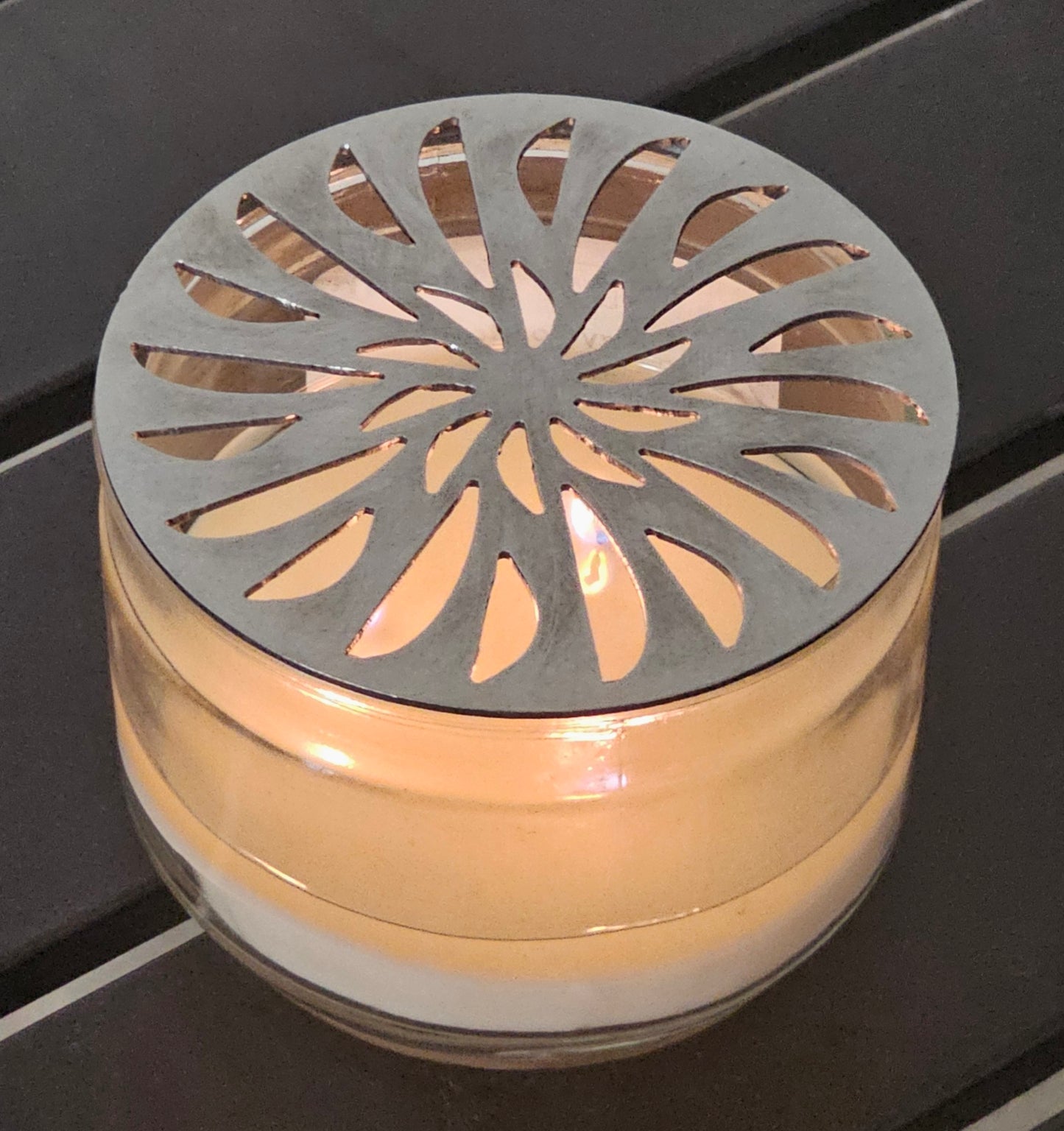 radiant pinwheel candle topper metal floral design