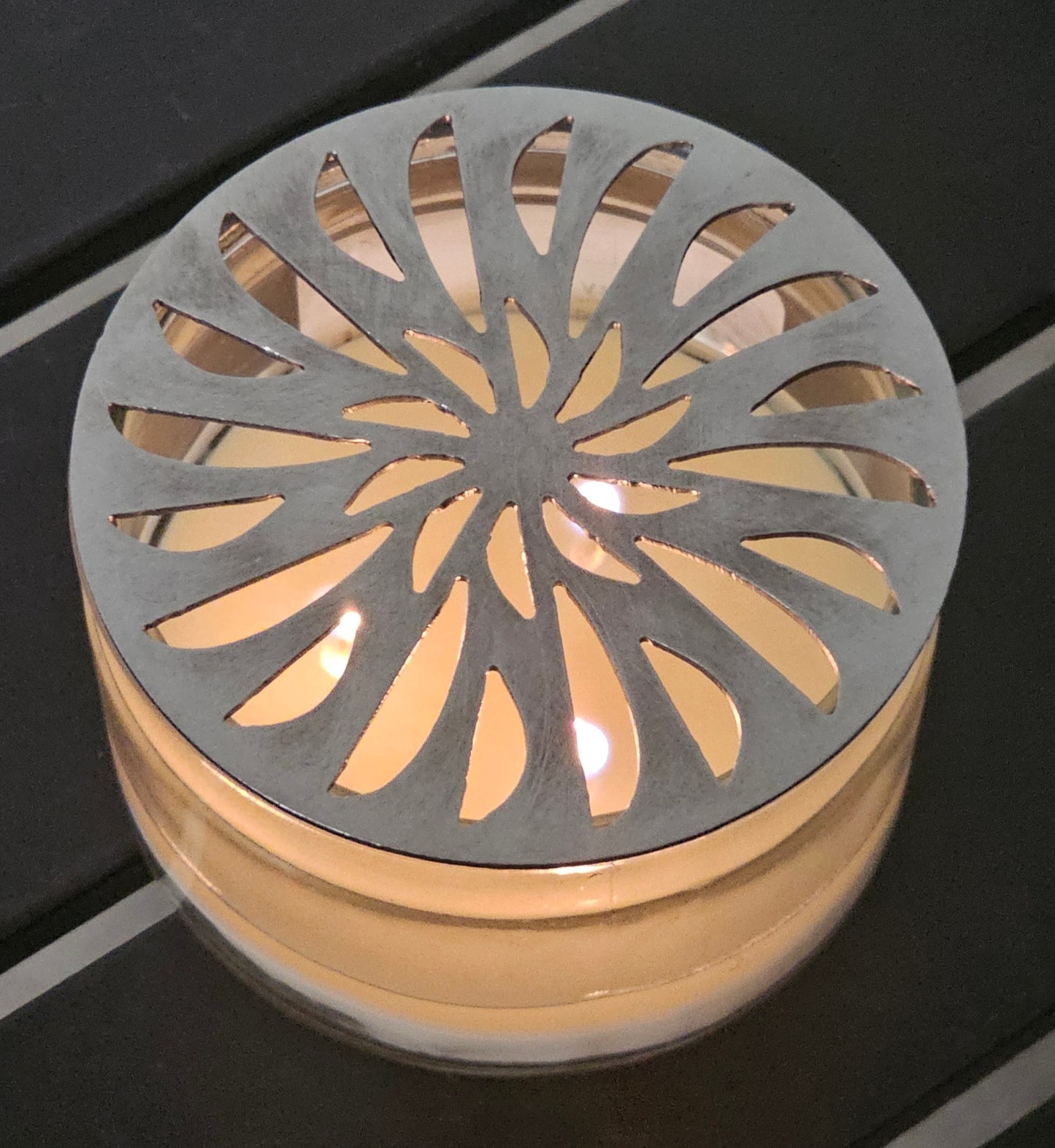 decorative metal candle lid pinwheel pattern