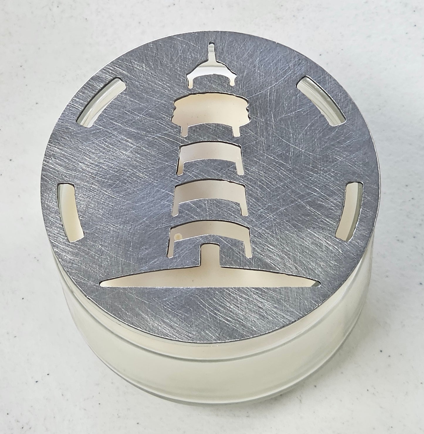 Lighthouse candle topper on jar candle