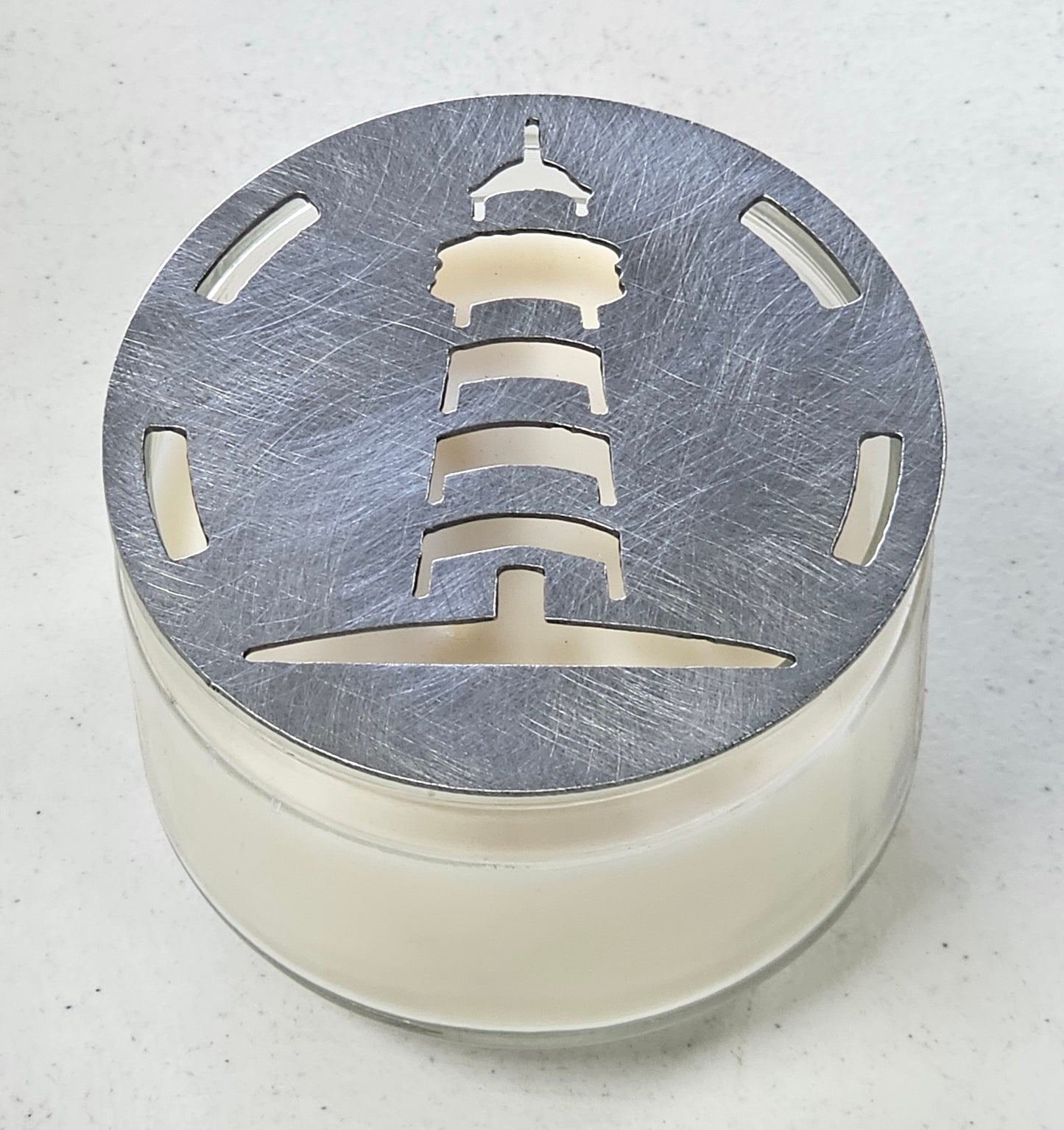 Lighthouse candle topper on jar candle