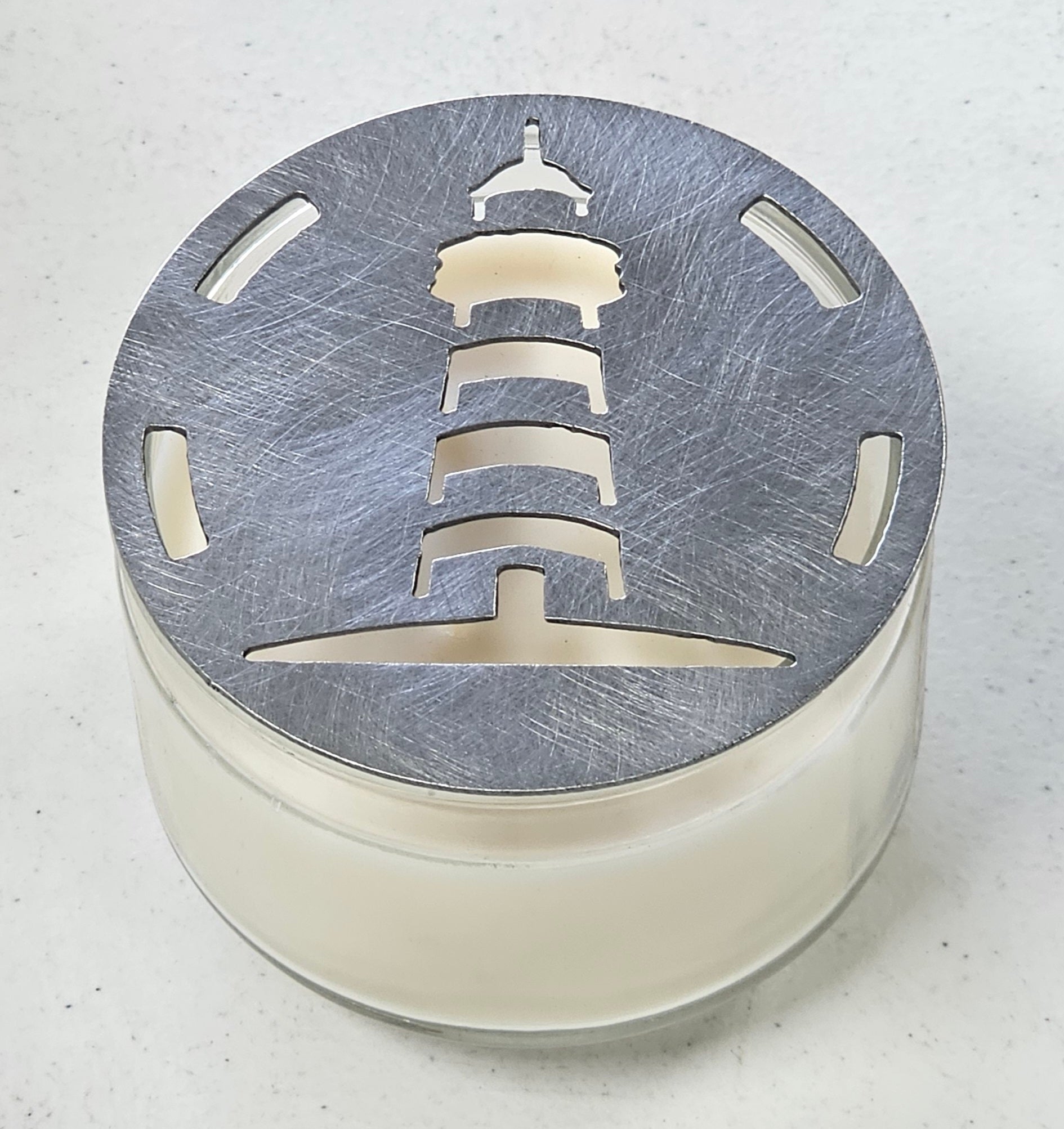 Lighthouse candle topper on jar candle