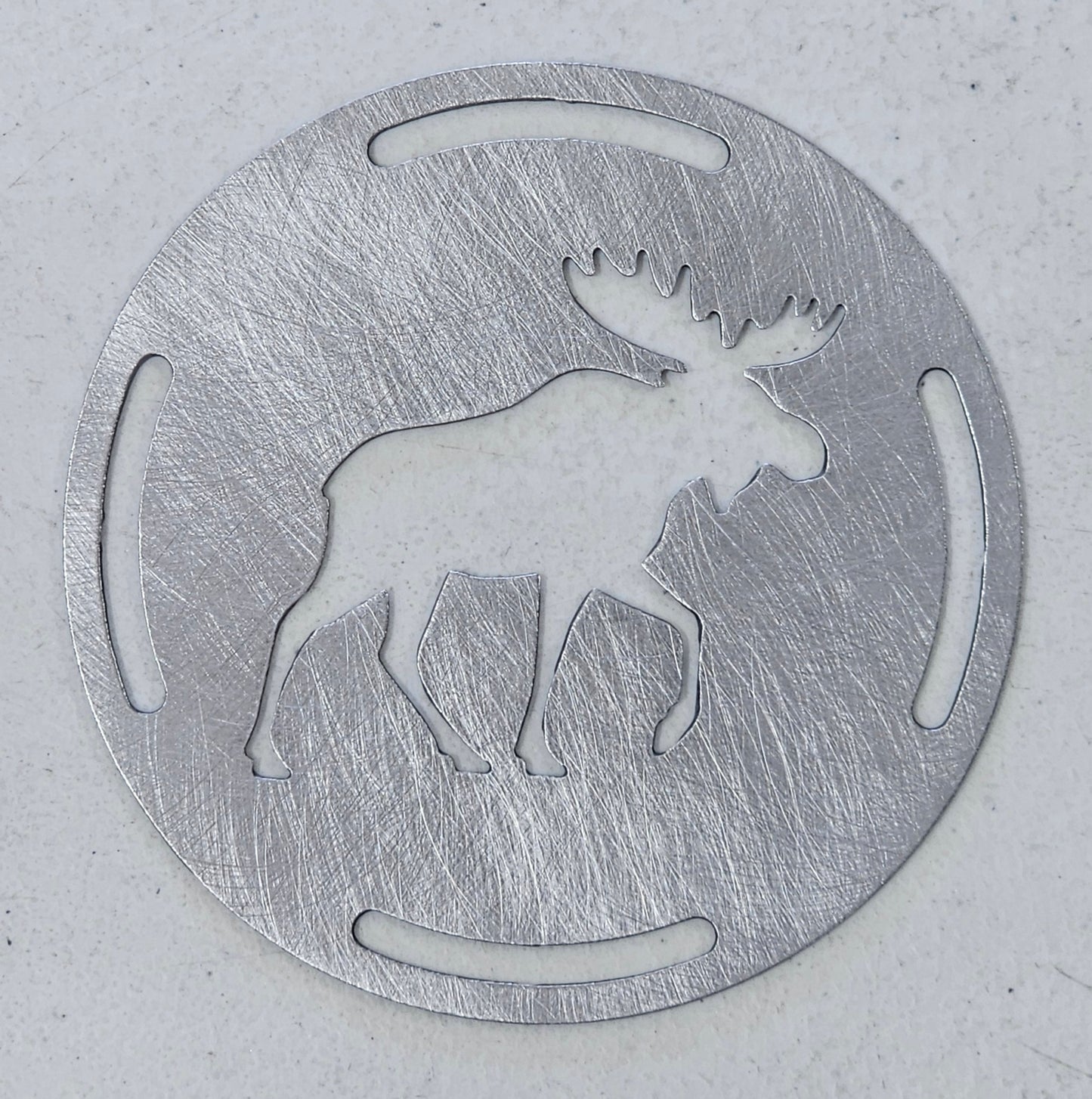 Flat metal moose candle topper on jar candle, rustic woodland candle accessory