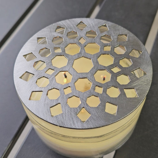 Geometric metal candle topper with Moroccan mandala constellation design