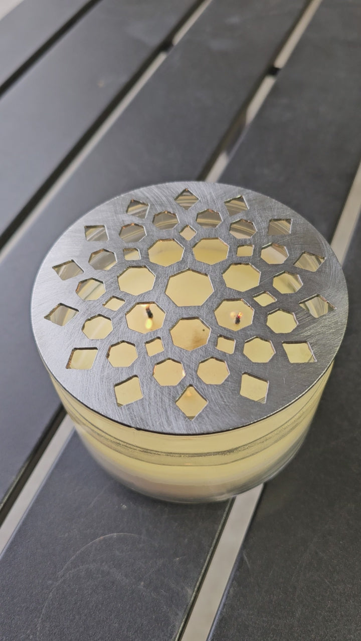 Geometric metal candle topper with Moroccan mandala constellation design