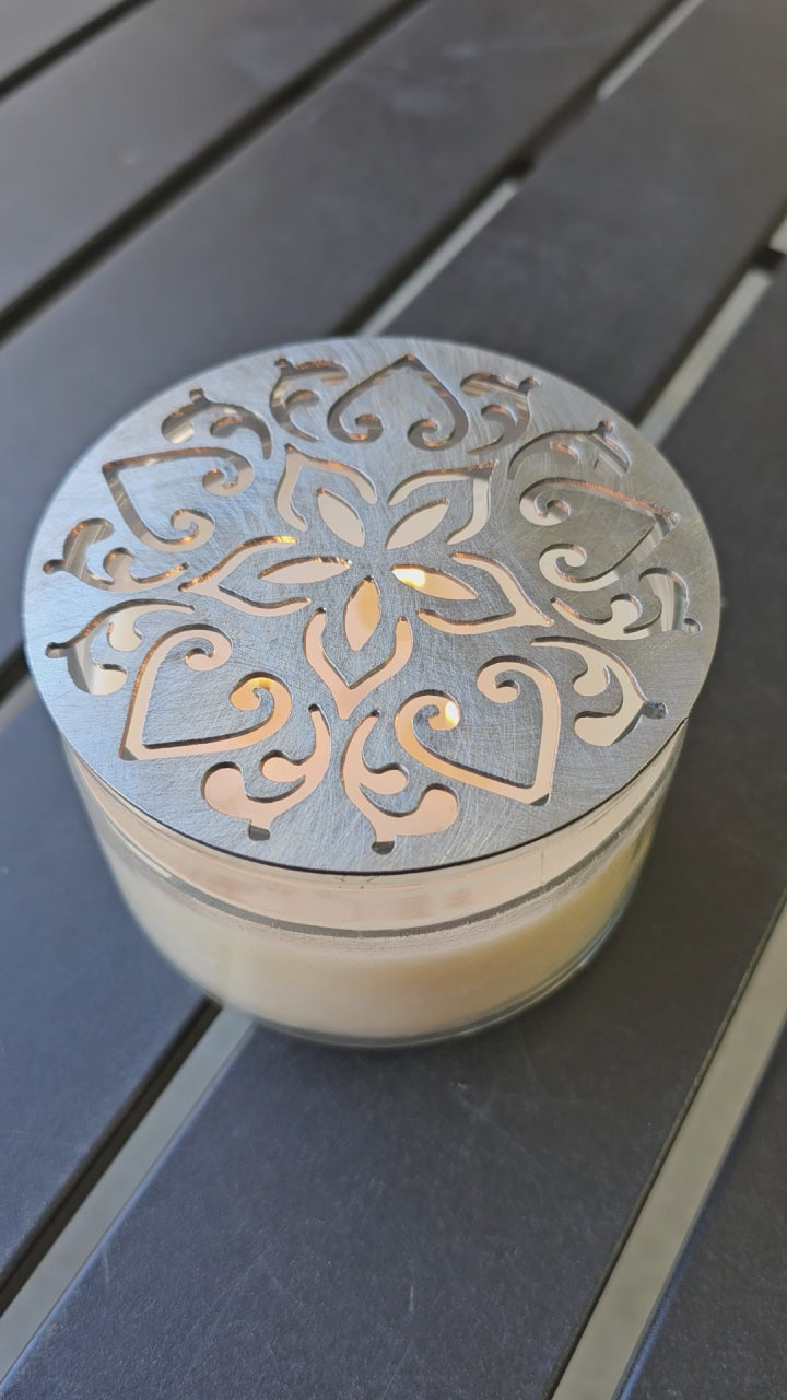 Ornate metal candle flame guard