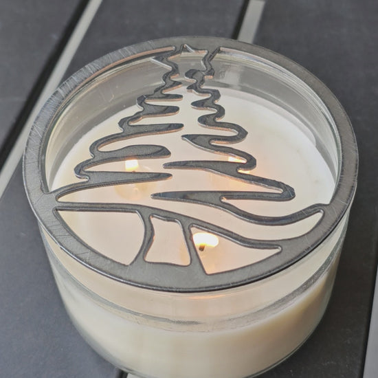 Holiday candle topper with tree silhouette design