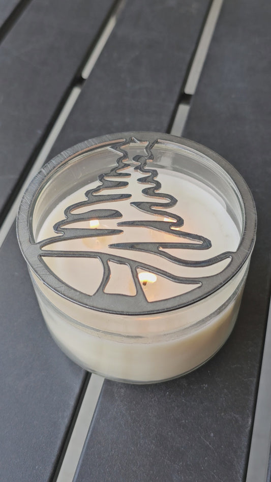 Holiday candle topper with tree silhouette design