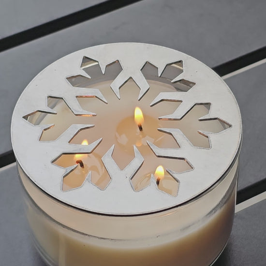Glacier snowflake metal candle topper on jar candle for Christmas decor