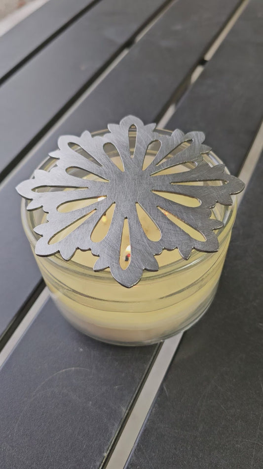 Classic snowflake metal candle topper on jar candle