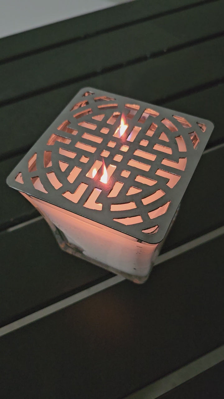 candle topper creating ambient light pattern