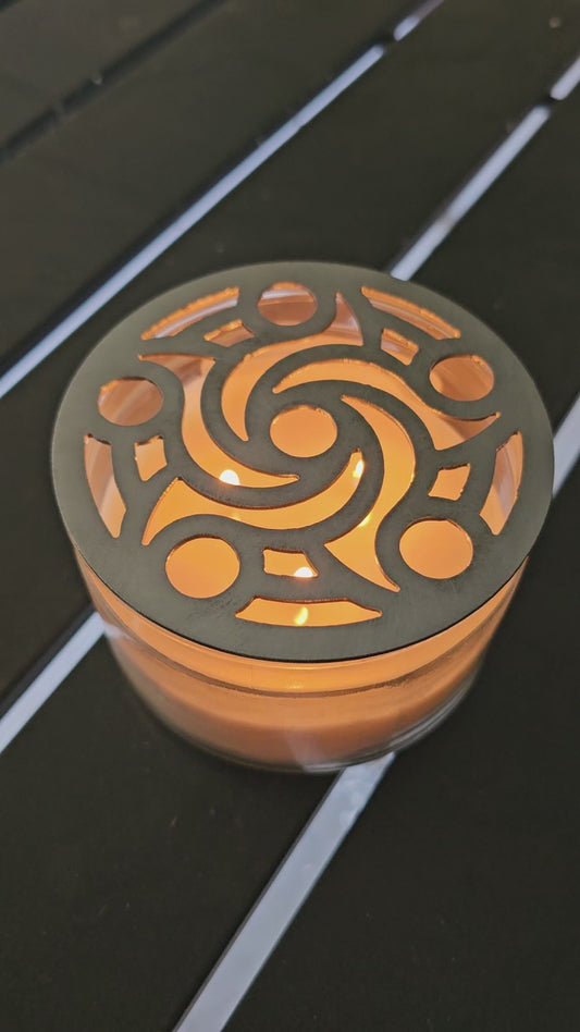 Reusable metal candle topper on jar candle